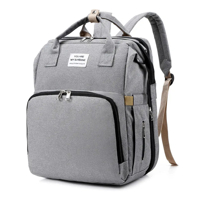 All-in-One Smart Mummy Nappy Bag with Foldable Baby Bed – USB Charging & Waterproof Design
